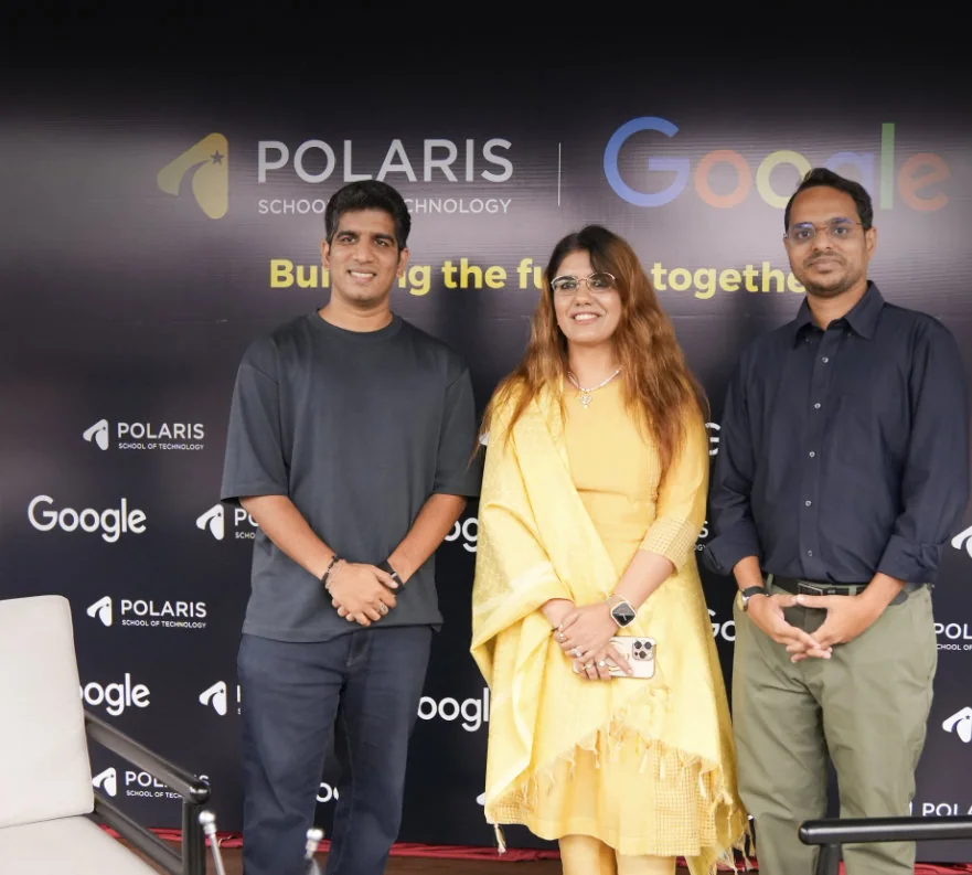 Polaris and Google team members in front of a ‘Building the future together’ backdrop